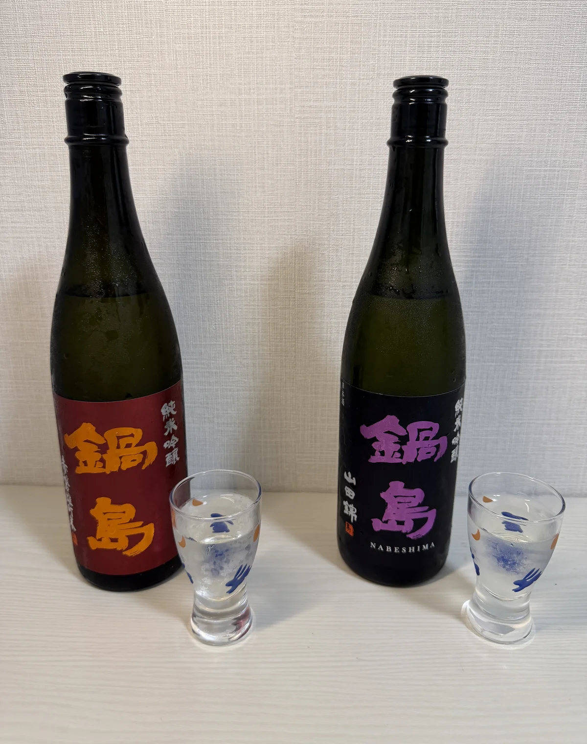 Nabeshima Junmai Ginjo Akaiwa Omachi and Yamada Nishiki bottles with rabbit-and-moon glasses