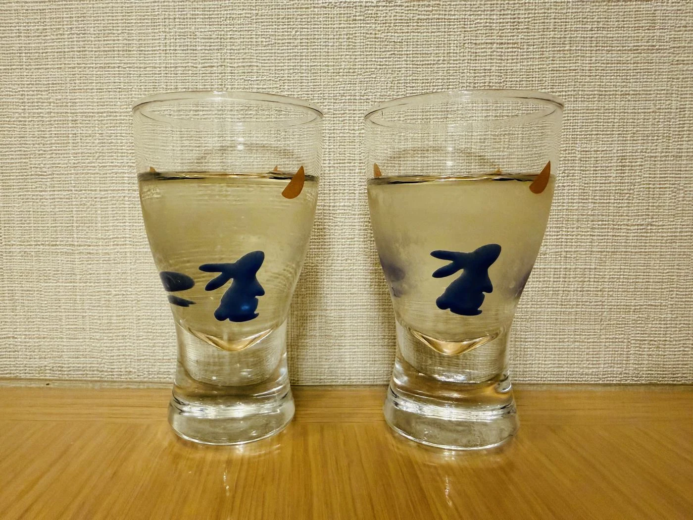 Mii no Kotobuki Fuku and +14 poured side by side in matching sake cups